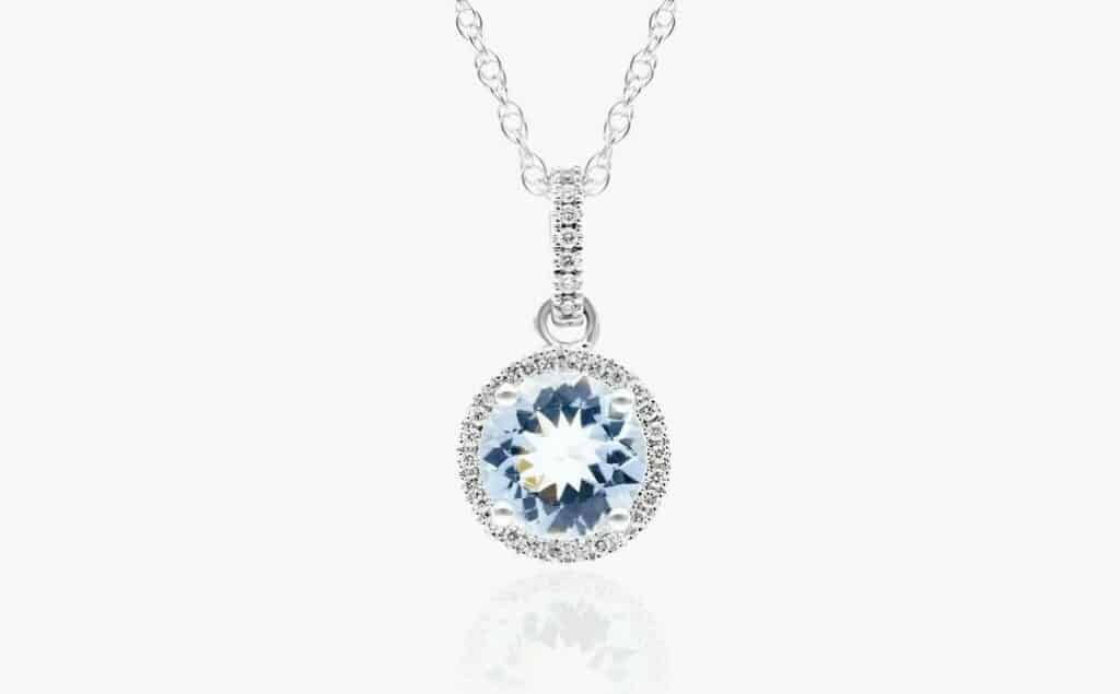 Aquamarine And Diamond halo pendant