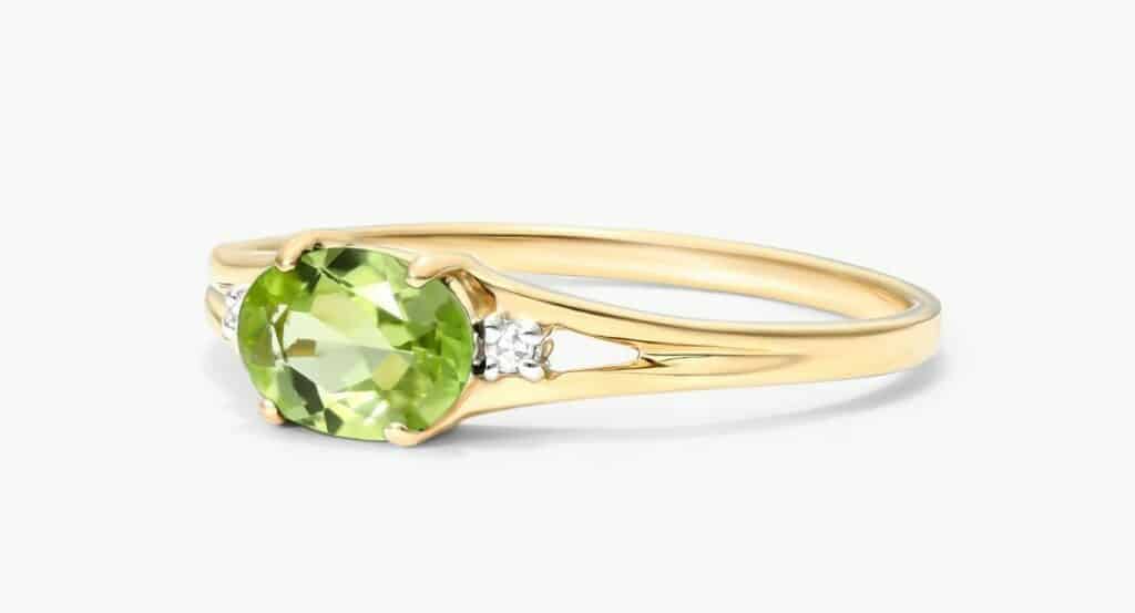 Oval Peridot and Diamond accent birthstone ring