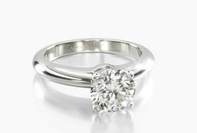 white gold solitaire setting with round diamond
