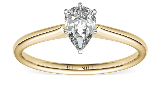 yellow gold solitaire with a pear shape diamond