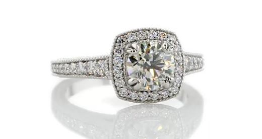 1.50ct cushion cut diamond in a vintage halo ring